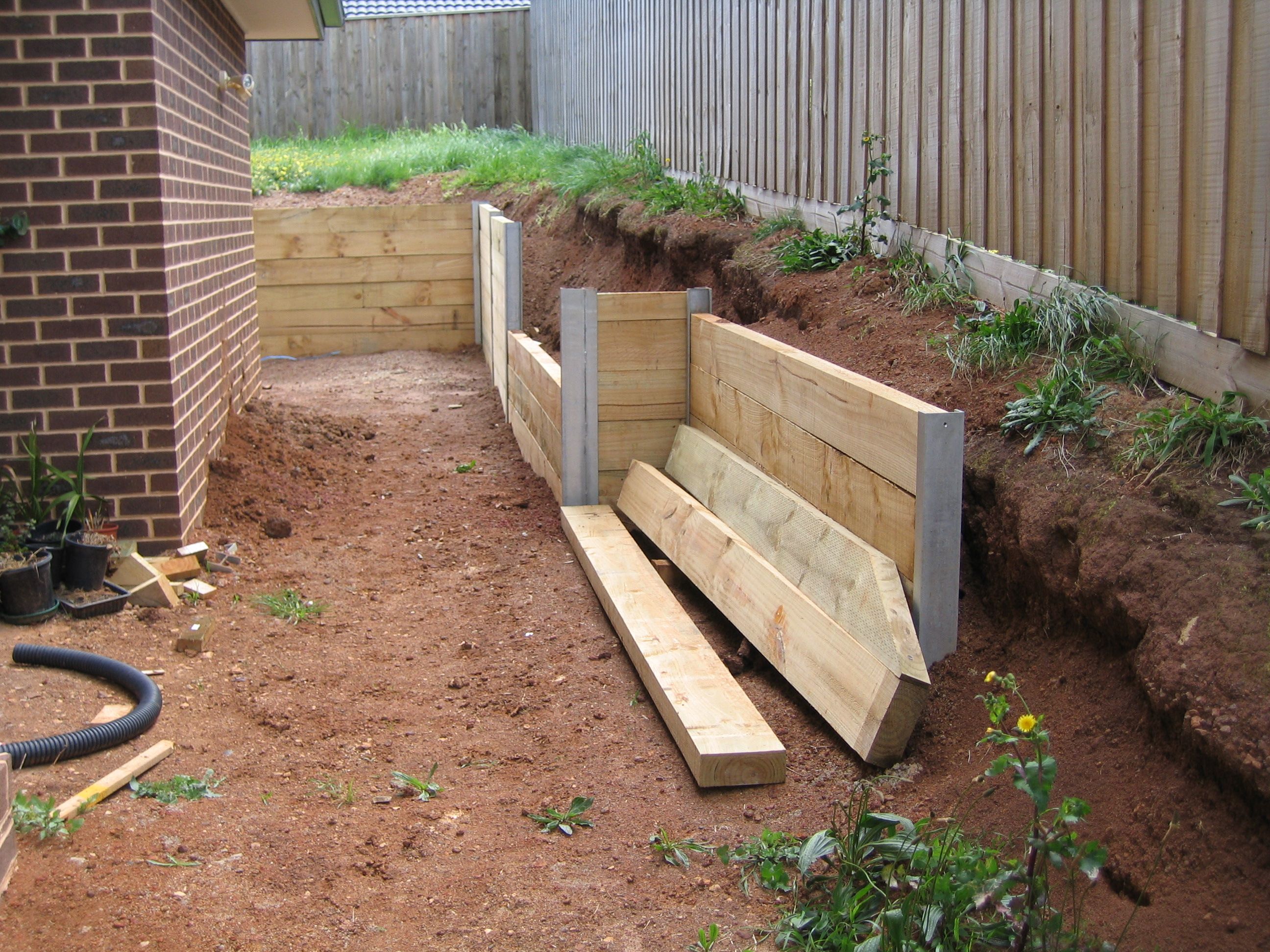 10+ Wooden Retaining Wall Ideas To Save You Money